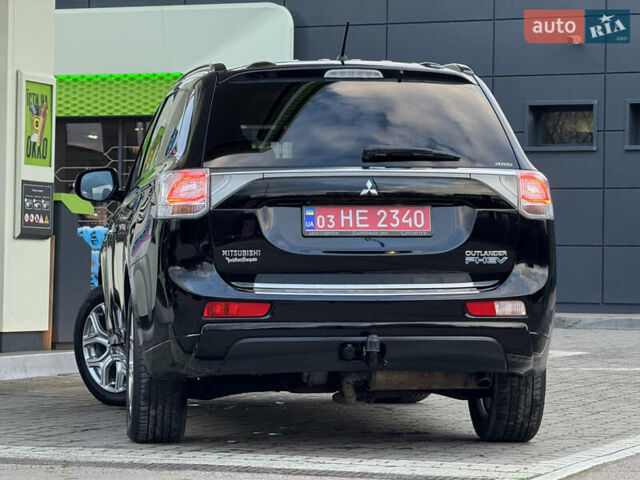 Чорний Міцубісі Аутлендер, об'ємом двигуна 2 л та пробігом 157 тис. км за 15299 $, фото 54 на Automoto.ua