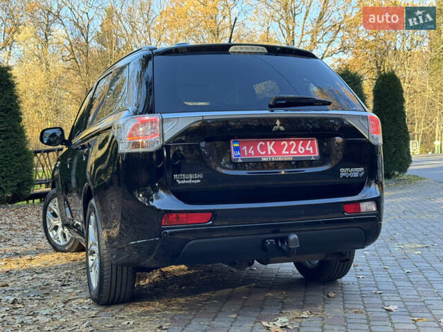 Чорний Міцубісі Аутлендер, об'ємом двигуна 2 л та пробігом 173 тис. км за 15299 $, фото 63 на Automoto.ua