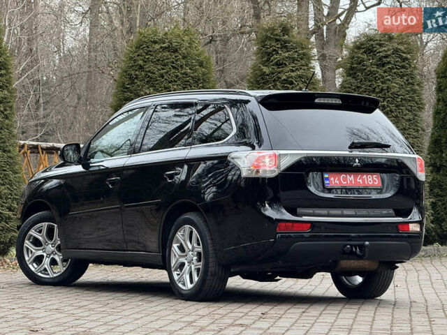 Черный Мицубиси Аутлендер, объемом двигателя 2 л и пробегом 173 тыс. км за 15299 $, фото 49 на Automoto.ua