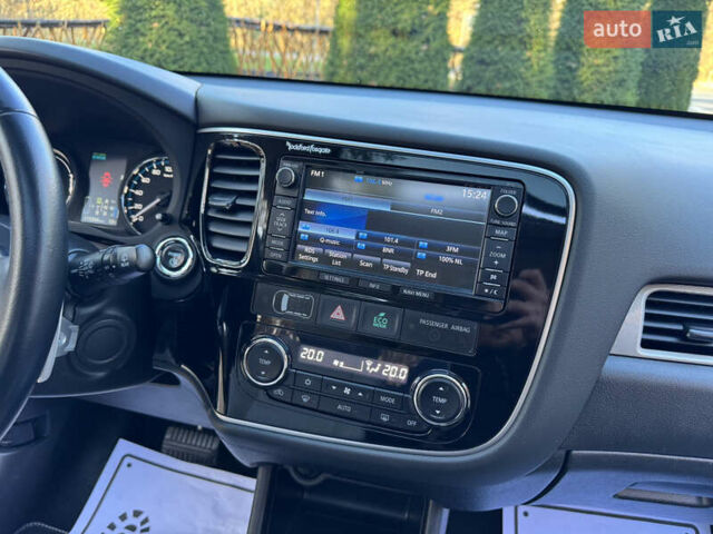 Чорний Міцубісі Аутлендер, об'ємом двигуна 2 л та пробігом 173 тис. км за 15299 $, фото 104 на Automoto.ua