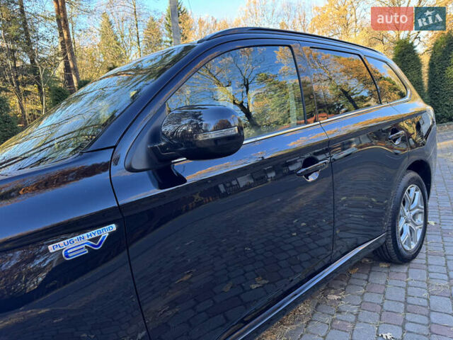 Чорний Міцубісі Аутлендер, об'ємом двигуна 2 л та пробігом 173 тис. км за 15299 $, фото 38 на Automoto.ua