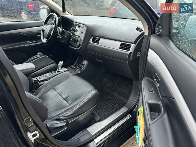 Черный Мицубиси Аутлендер, объемом двигателя 2 л и пробегом 223 тыс. км за 13400 $, фото 12 на Automoto.ua