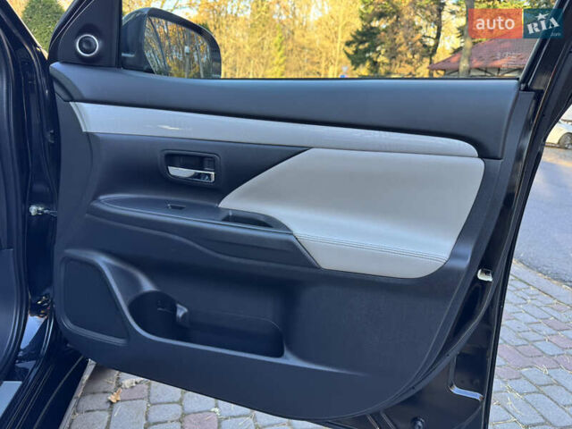 Чорний Міцубісі Аутлендер, об'ємом двигуна 2 л та пробігом 173 тис. км за 15299 $, фото 95 на Automoto.ua