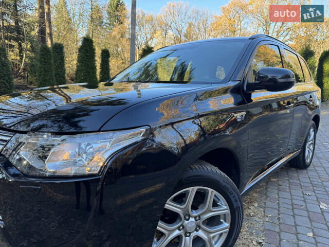 Чорний Міцубісі Аутлендер, об'ємом двигуна 2 л та пробігом 173 тис. км за 15299 $, фото 35 на Automoto.ua