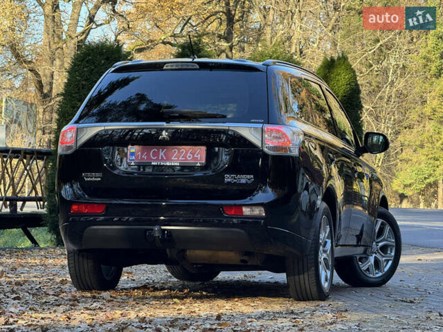 Чорний Міцубісі Аутлендер, об'ємом двигуна 2 л та пробігом 173 тис. км за 15299 $, фото 45 на Automoto.ua
