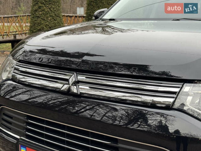 Черный Мицубиси Аутлендер, объемом двигателя 2 л и пробегом 173 тыс. км за 15299 $, фото 25 на Automoto.ua