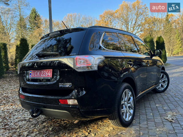 Чорний Міцубісі Аутлендер, об'ємом двигуна 2 л та пробігом 173 тис. км за 15299 $, фото 48 на Automoto.ua