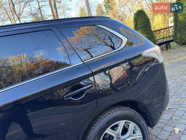 Чорний Міцубісі Аутлендер, об'ємом двигуна 2 л та пробігом 173 тис. км за 15299 $, фото 42 на Automoto.ua