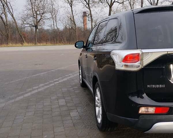 Чорний Міцубісі Аутлендер, об'ємом двигуна 2.4 л та пробігом 224 тис. км за 12000 $, фото 3 на Automoto.ua