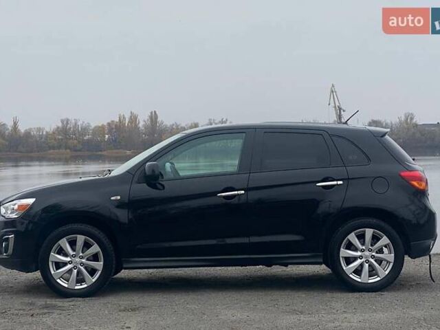 Чорний Міцубісі Аутлендер, об'ємом двигуна 2 л та пробігом 250 тис. км за 10800 $, фото 7 на Automoto.ua