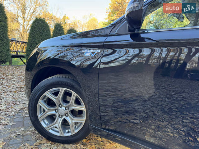 Чорний Міцубісі Аутлендер, об'ємом двигуна 2 л та пробігом 173 тис. км за 15299 $, фото 75 на Automoto.ua