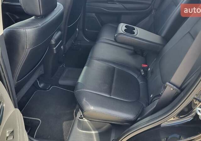 Чорний Міцубісі Аутлендер, об'ємом двигуна 2 л та пробігом 237 тис. км за 13800 $, фото 19 на Automoto.ua