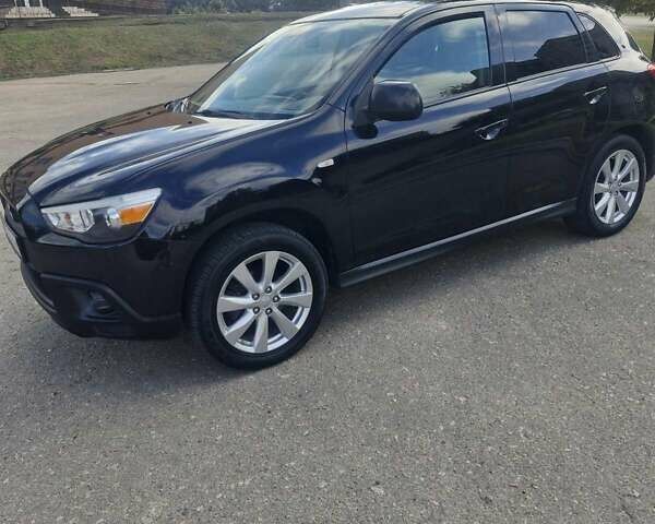 Чорний Міцубісі Аутлендер, об'ємом двигуна 2 л та пробігом 83 тис. км за 13500 $, фото 5 на Automoto.ua