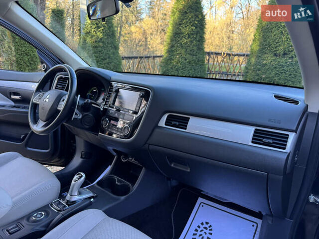 Чорний Міцубісі Аутлендер, об'ємом двигуна 2 л та пробігом 173 тис. км за 15299 $, фото 102 на Automoto.ua