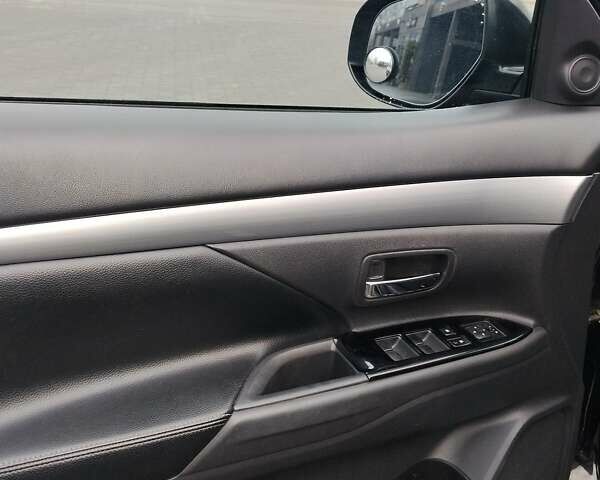 Чорний Міцубісі Аутлендер, об'ємом двигуна 2.4 л та пробігом 224 тис. км за 12000 $, фото 14 на Automoto.ua