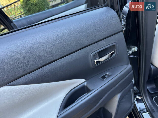 Чорний Міцубісі Аутлендер, об'ємом двигуна 2 л та пробігом 173 тис. км за 15299 $, фото 108 на Automoto.ua