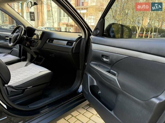 Черный Мицубиси Аутлендер, объемом двигателя 2.4 л и пробегом 270 тыс. км за 12500 $, фото 24 на Automoto.ua