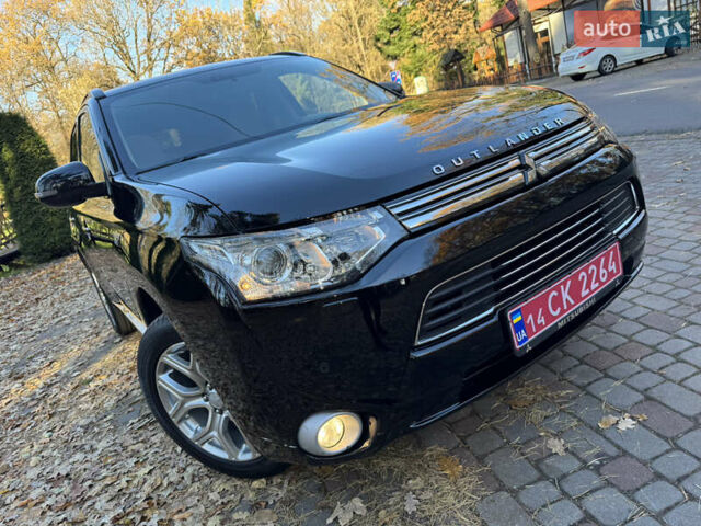 Чорний Міцубісі Аутлендер, об'ємом двигуна 2 л та пробігом 173 тис. км за 15299 $, фото 9 на Automoto.ua
