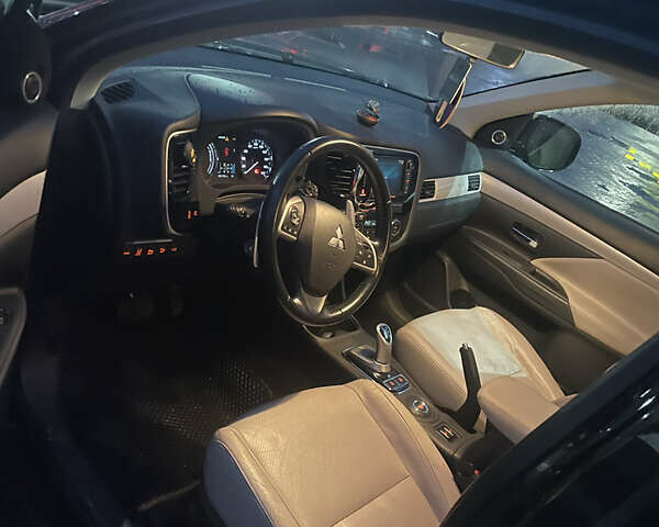 Черный Мицубиси Аутлендер, объемом двигателя 2 л и пробегом 206 тыс. км за 14500 $, фото 7 на Automoto.ua