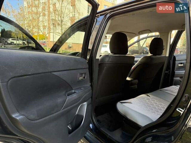 Черный Мицубиси Аутлендер, объемом двигателя 2.4 л и пробегом 270 тыс. км за 12500 $, фото 30 на Automoto.ua