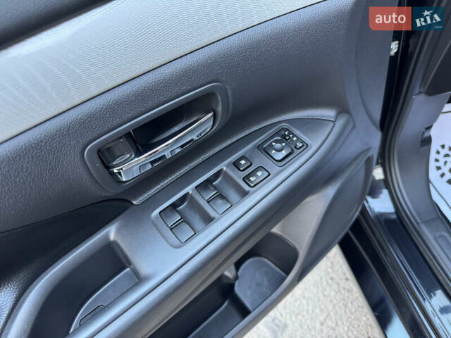 Чорний Міцубісі Аутлендер, об'ємом двигуна 2 л та пробігом 157 тис. км за 15299 $, фото 68 на Automoto.ua