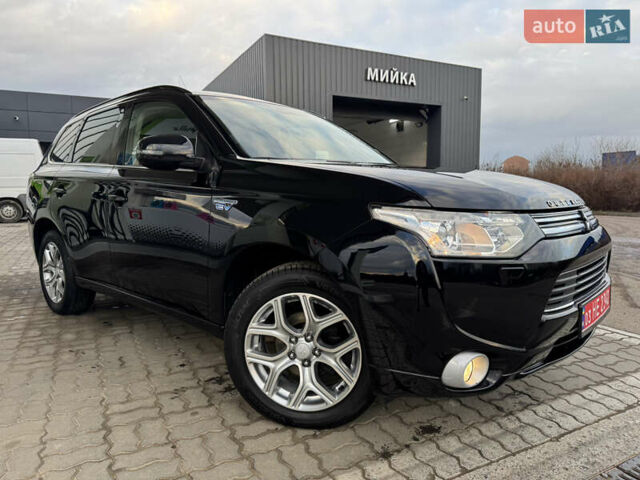 Чорний Міцубісі Аутлендер, об'ємом двигуна 2 л та пробігом 157 тис. км за 15299 $, фото 10 на Automoto.ua