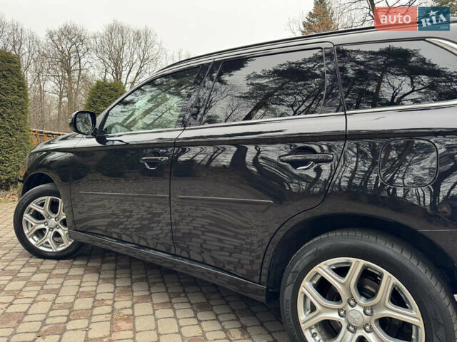 Черный Мицубиси Аутлендер, объемом двигателя 2 л и пробегом 173 тыс. км за 15299 $, фото 62 на Automoto.ua