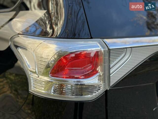 Черный Мицубиси Аутлендер, объемом двигателя 2.4 л и пробегом 270 тыс. км за 12500 $, фото 45 на Automoto.ua