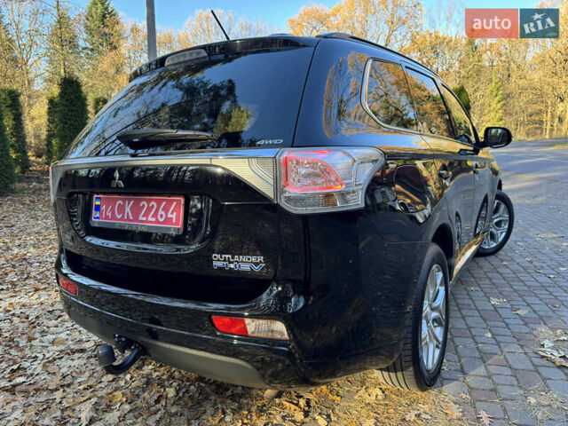 Чорний Міцубісі Аутлендер, об'ємом двигуна 2 л та пробігом 173 тис. км за 15299 $, фото 50 на Automoto.ua