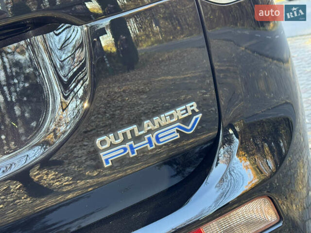 Чорний Міцубісі Аутлендер, об'ємом двигуна 2 л та пробігом 173 тис. км за 15299 $, фото 52 на Automoto.ua