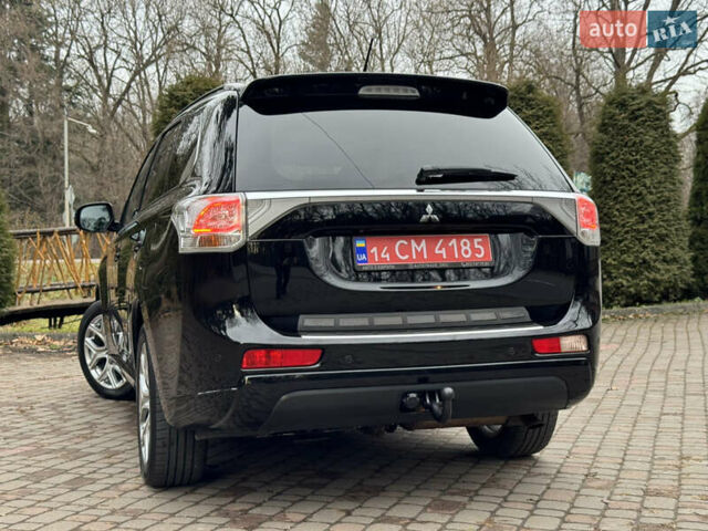 Черный Мицубиси Аутлендер, объемом двигателя 2 л и пробегом 173 тыс. км за 15299 $, фото 53 на Automoto.ua