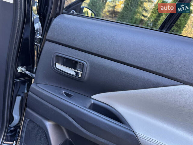 Чорний Міцубісі Аутлендер, об'ємом двигуна 2 л та пробігом 173 тис. км за 15299 $, фото 116 на Automoto.ua