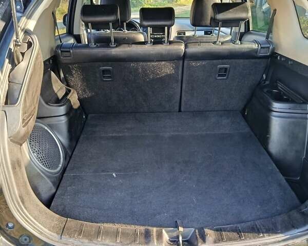 Черный Мицубиси Аутлендер, объемом двигателя 2.27 л и пробегом 260 тыс. км за 14850 $, фото 9 на Automoto.ua