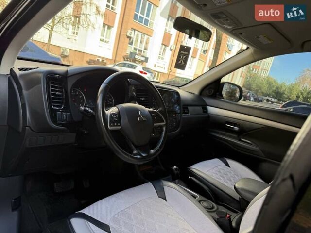 Черный Мицубиси Аутлендер, объемом двигателя 2.4 л и пробегом 270 тыс. км за 12500 $, фото 19 на Automoto.ua