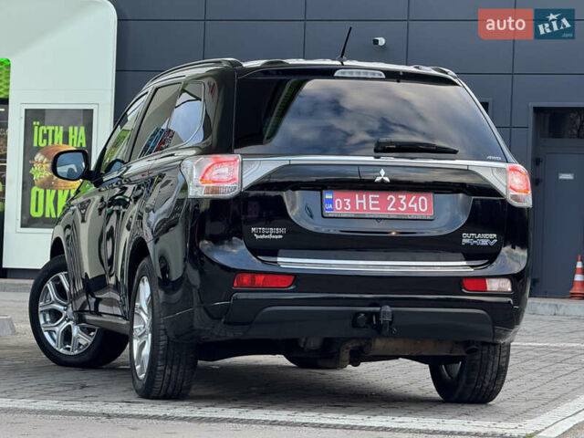 Чорний Міцубісі Аутлендер, об'ємом двигуна 2 л та пробігом 157 тис. км за 15299 $, фото 53 на Automoto.ua