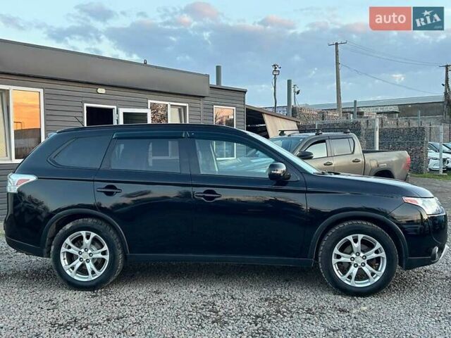 Чорний Міцубісі Аутлендер, об'ємом двигуна 2.4 л та пробігом 199 тис. км за 12800 $, фото 2 на Automoto.ua