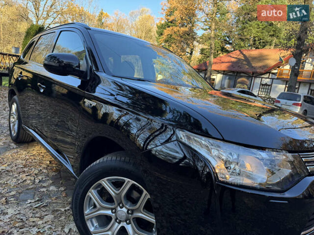 Чорний Міцубісі Аутлендер, об'ємом двигуна 2 л та пробігом 173 тис. км за 15299 $, фото 12 на Automoto.ua