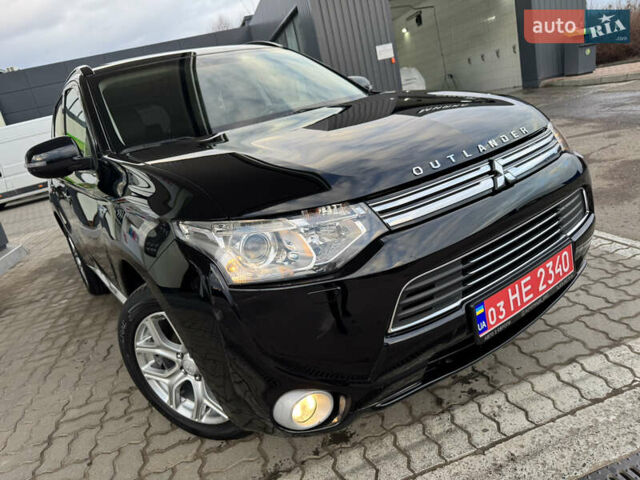 Чорний Міцубісі Аутлендер, об'ємом двигуна 2 л та пробігом 157 тис. км за 15299 $, фото 9 на Automoto.ua