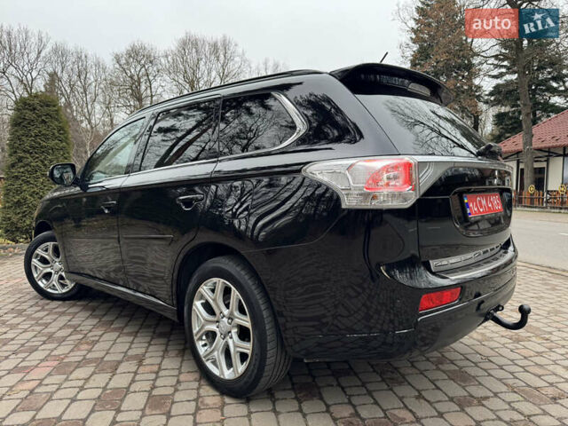 Черный Мицубиси Аутлендер, объемом двигателя 2 л и пробегом 173 тыс. км за 15299 $, фото 60 на Automoto.ua