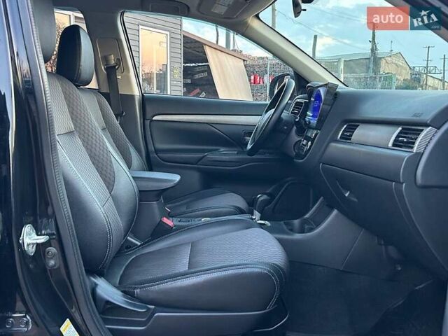 Чорний Міцубісі Аутлендер, об'ємом двигуна 2.4 л та пробігом 199 тис. км за 12800 $, фото 32 на Automoto.ua