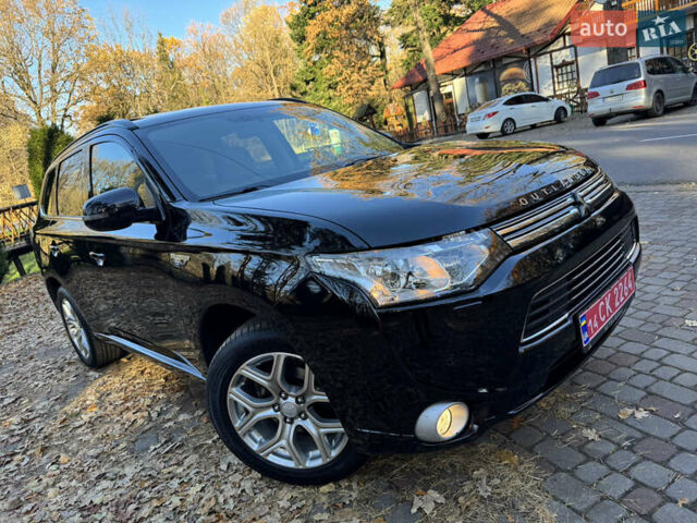 Чорний Міцубісі Аутлендер, об'ємом двигуна 2 л та пробігом 173 тис. км за 15299 $, фото 11 на Automoto.ua