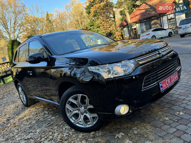 Чорний Міцубісі Аутлендер, об'ємом двигуна 2 л та пробігом 173 тис. км за 15299 $, фото 6 на Automoto.ua
