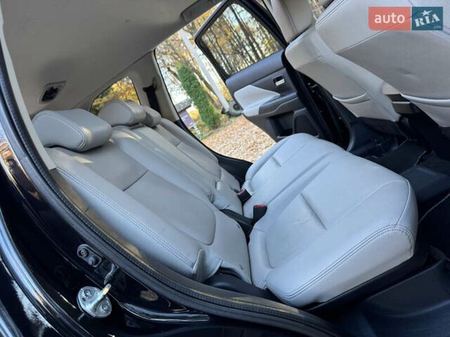 Чорний Міцубісі Аутлендер, об'ємом двигуна 2 л та пробігом 173 тис. км за 15299 $, фото 117 на Automoto.ua