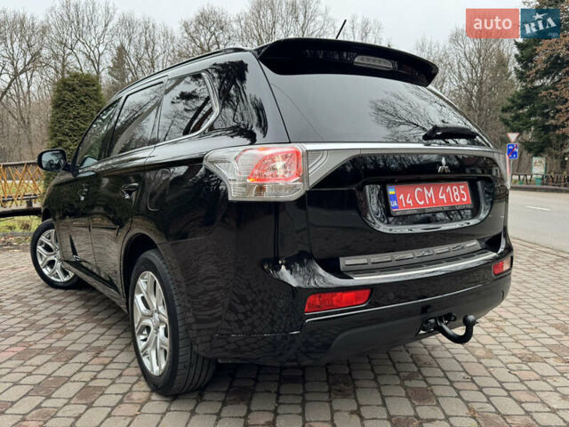 Черный Мицубиси Аутлендер, объемом двигателя 2 л и пробегом 173 тыс. км за 15299 $, фото 54 на Automoto.ua