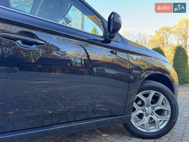 Чорний Міцубісі Аутлендер, об'ємом двигуна 2 л та пробігом 173 тис. км за 15299 $, фото 58 на Automoto.ua