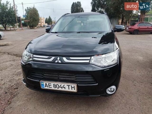 Черный Мицубиси Аутлендер, объемом двигателя 2.4 л и пробегом 220 тыс. км за 13400 $, фото 2 на Automoto.ua