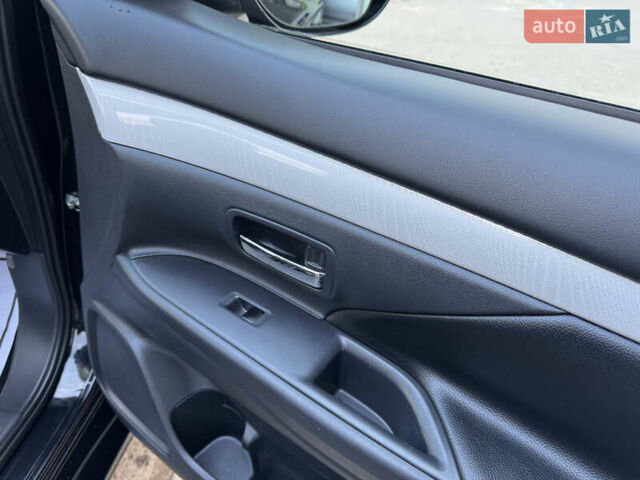 Чорний Міцубісі Аутлендер, об'ємом двигуна 2 л та пробігом 157 тис. км за 15299 $, фото 82 на Automoto.ua