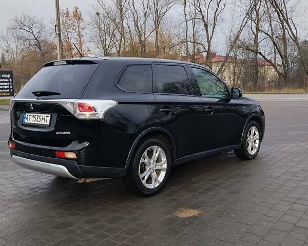Чорний Міцубісі Аутлендер, об'ємом двигуна 2.4 л та пробігом 224 тис. км за 12000 $, фото 4 на Automoto.ua