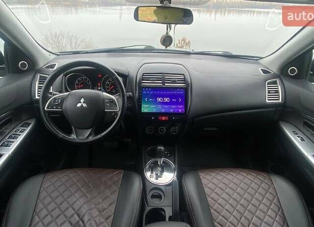 Чорний Міцубісі Аутлендер, об'ємом двигуна 2 л та пробігом 250 тис. км за 10800 $, фото 13 на Automoto.ua