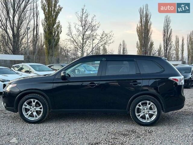 Чорний Міцубісі Аутлендер, об'ємом двигуна 2.4 л та пробігом 199 тис. км за 12800 $, фото 7 на Automoto.ua